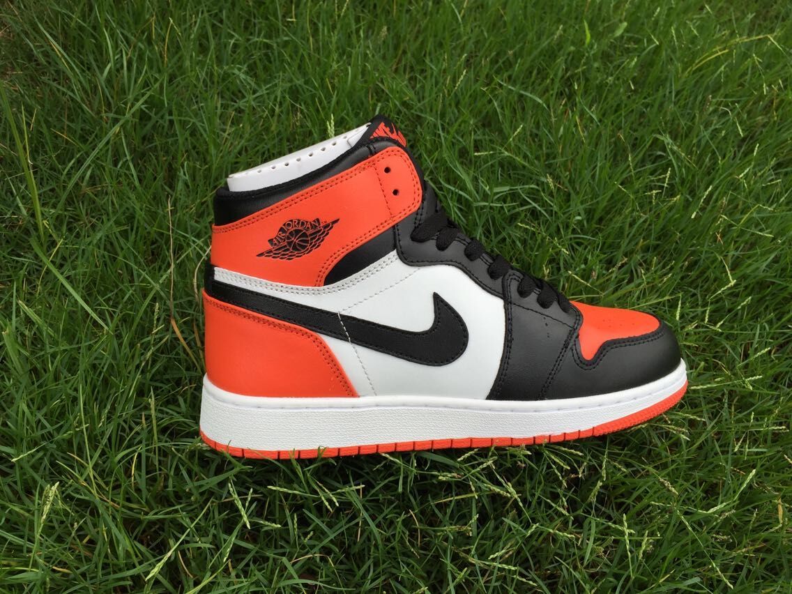Women's Jordan 1 High Black Orange White Sneakers - product image from the listing.