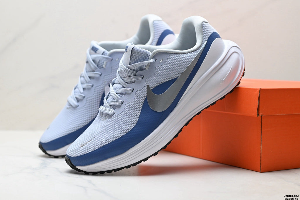 Nike Revolution 8 Running Shoes, in Light Blue and Navy - product image from the listing.