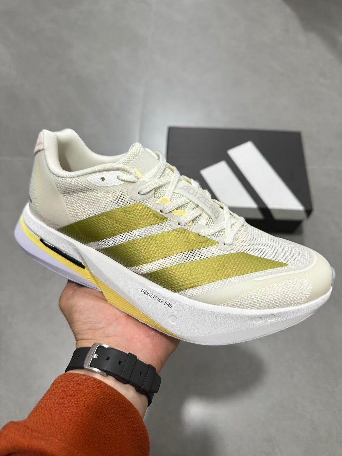adidas Lightstrike Pro Running Shoes in White Green - product image from the listing.