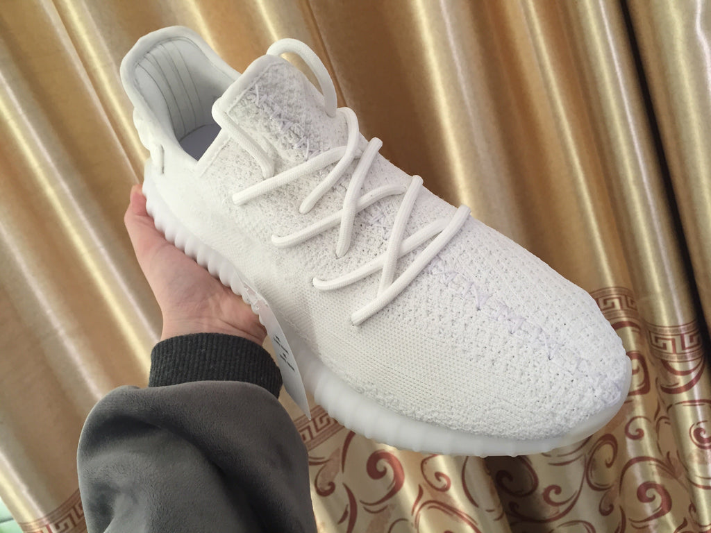 Yeezy 350 V2 Low-Top Sneakers in White Knit - product image from the listing.