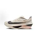 Light Beige and Black Nike ZoomX Running Shoes - product image from the listing.