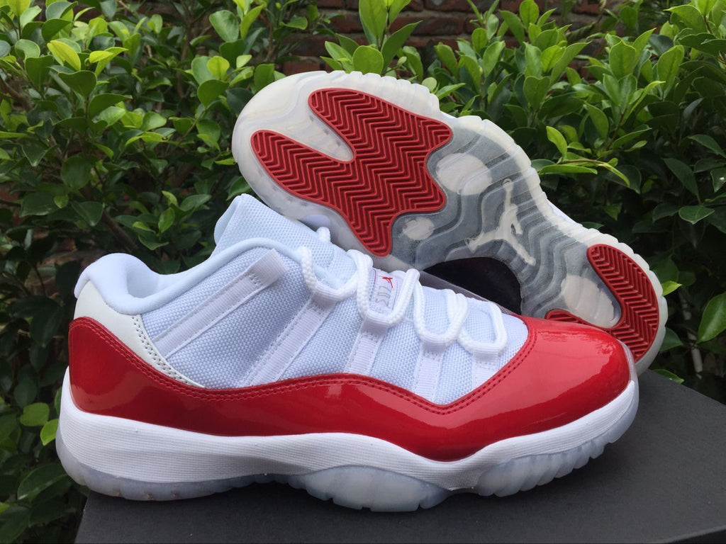 Air Jordan 11 Low Sneakers White Red - product image from the listing.