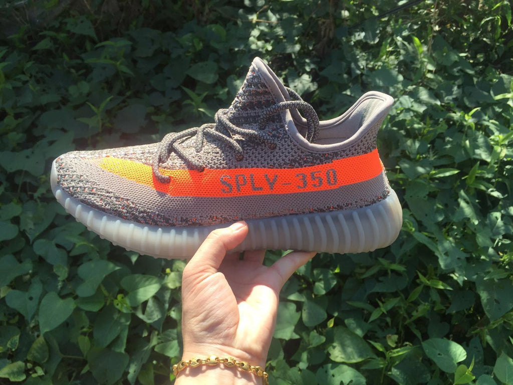 Yeezy 350 V2 Sneakers in Gray and Orange Knit - product image from the listing.