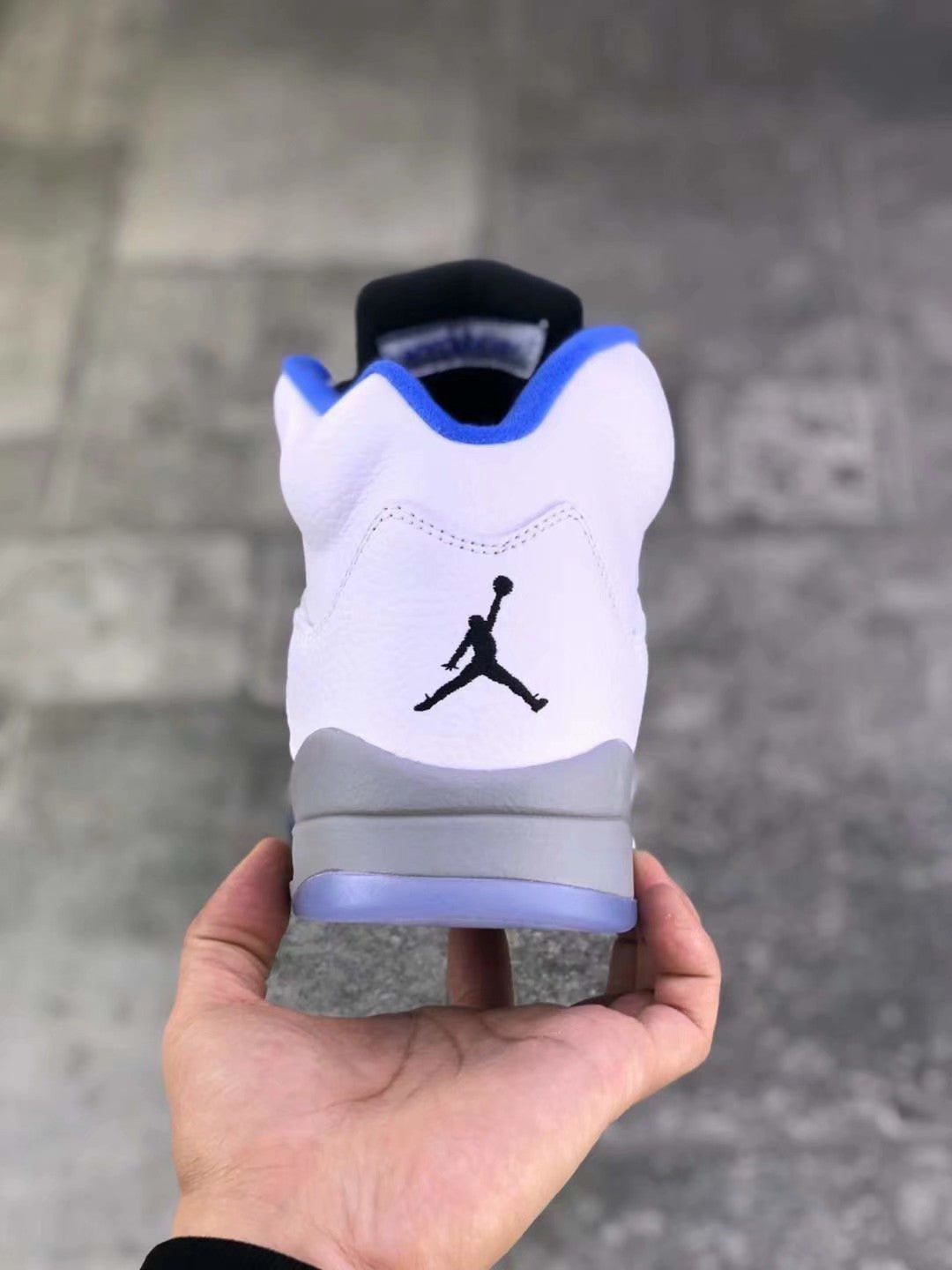Air Jordan 5 Stealth 2.0 Sneakers in White Blue 440888-140 - product image from the listing.