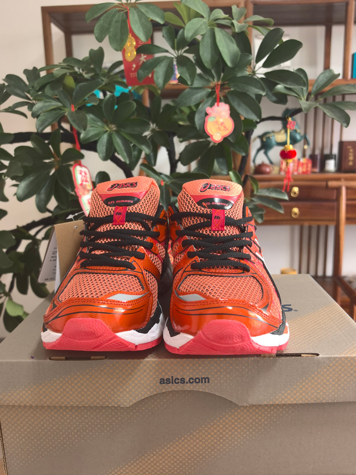 ASICS GEL-KAYANO 14 Sneakers in Orange and Pink - product image from the listing.