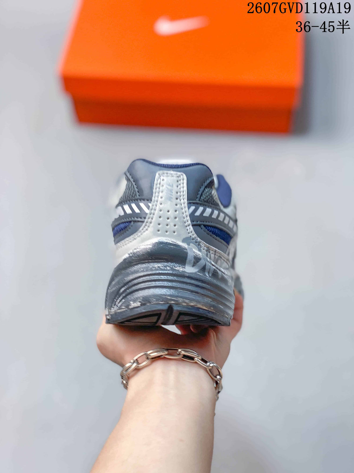 Nike Initiator Sneakers in Black and Grey - product image from the listing.
