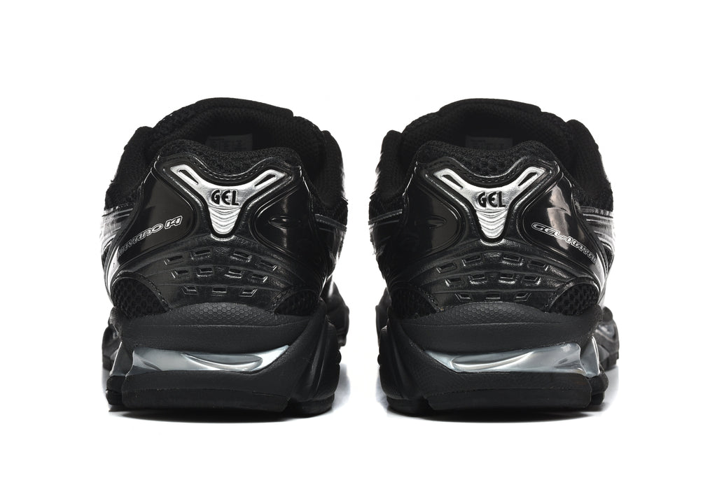 ASICS Gel-Kayano 14 Sneakers in Black and Silver - product image from the listing.
