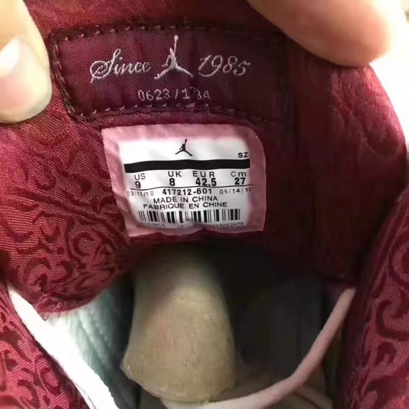 Jordan 13 Sneakers in Burgundy Brown White - product image from the listing.