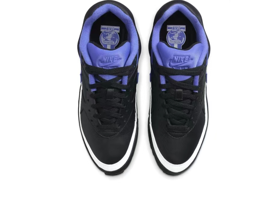 Nike Air Max Low-Top Sneakers in Black and Blue - product image from the listing.