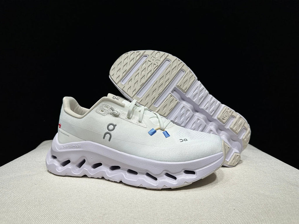 On Cloudtilt Trainers in White and Lavender - product image from the listing.