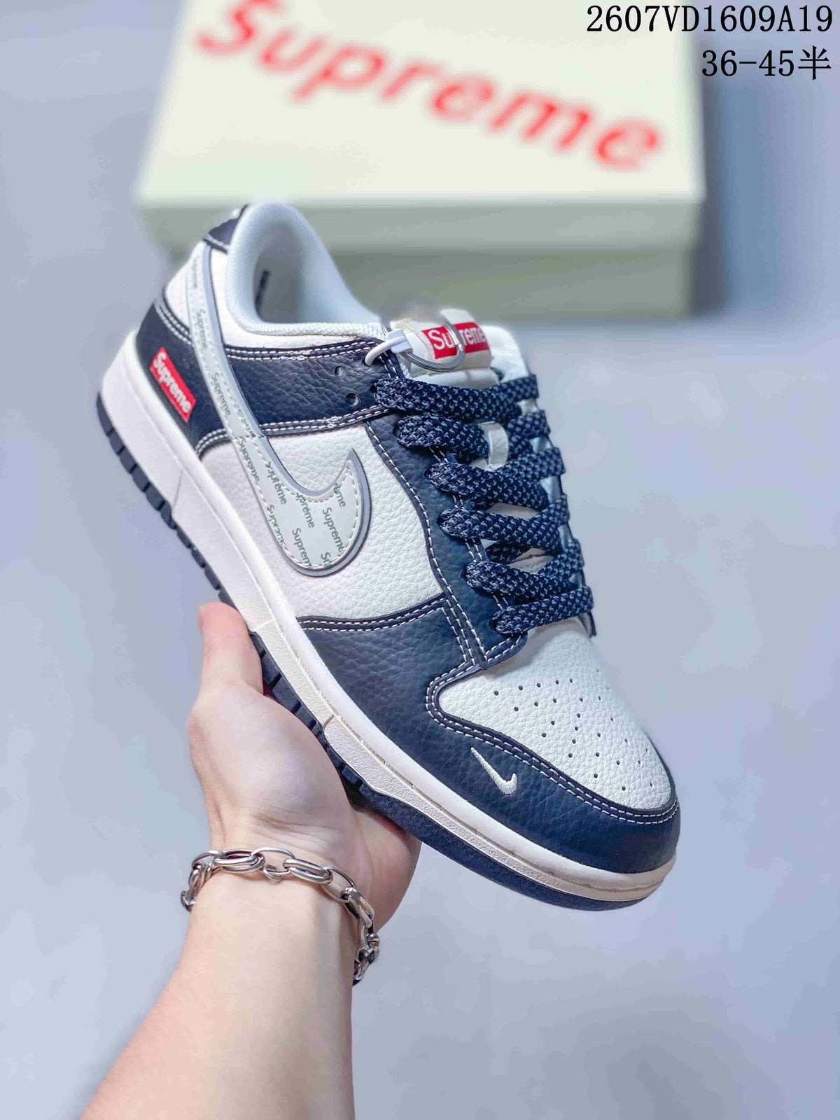 Nike Dunk Low Retro Custom Sneakers in White and Navy - product image from the listing.