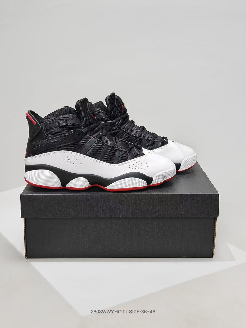 Jordan 6-12 Sneakers in Black White Red - product image from the listing.