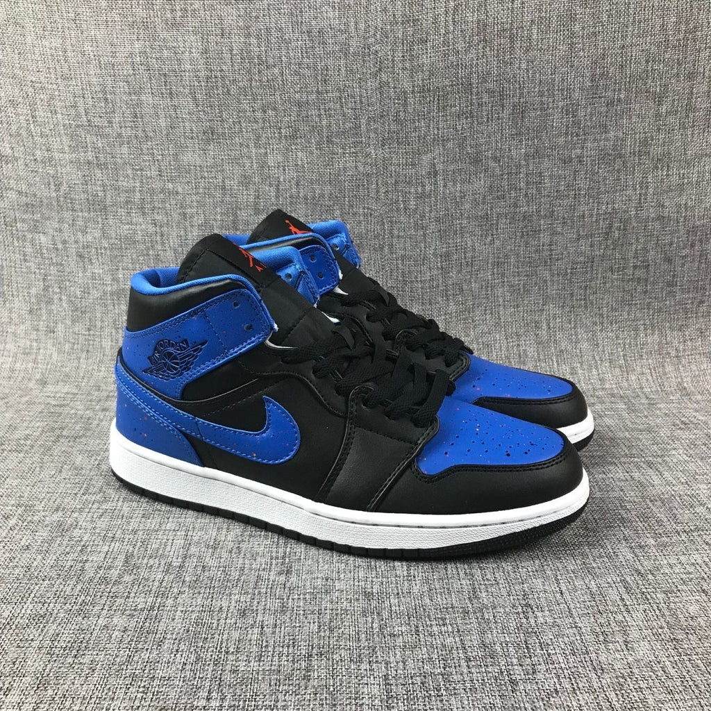 Air Jordan 1 Mid High-Top Sneakers in Black and Blue - product image from the listing.