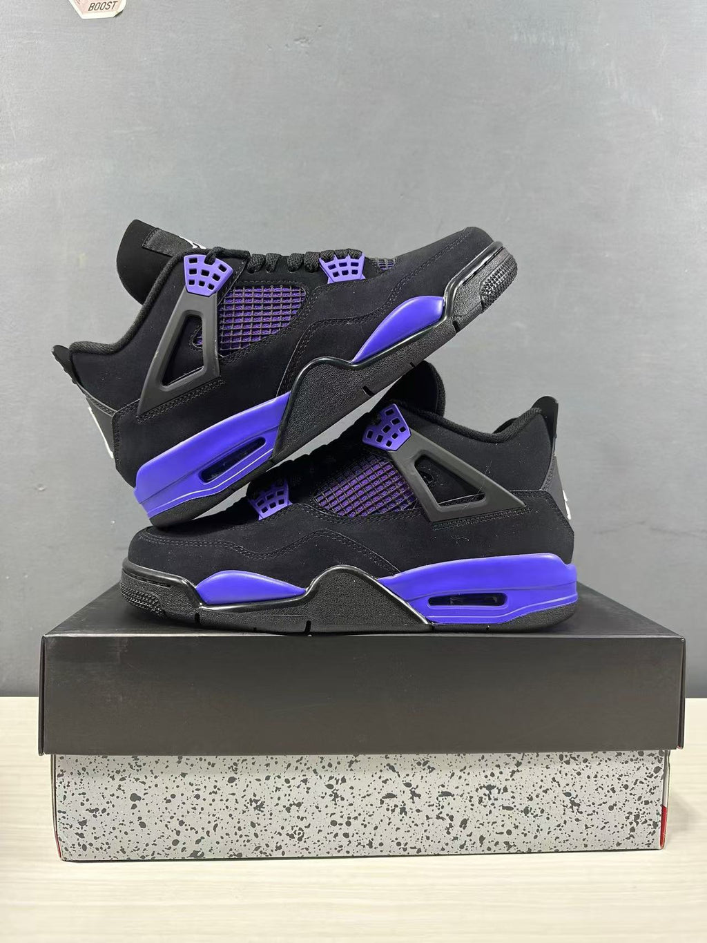 Air Jordan 4 Retro Black Blue Sneakers CT8527-018 - product image from the listing.