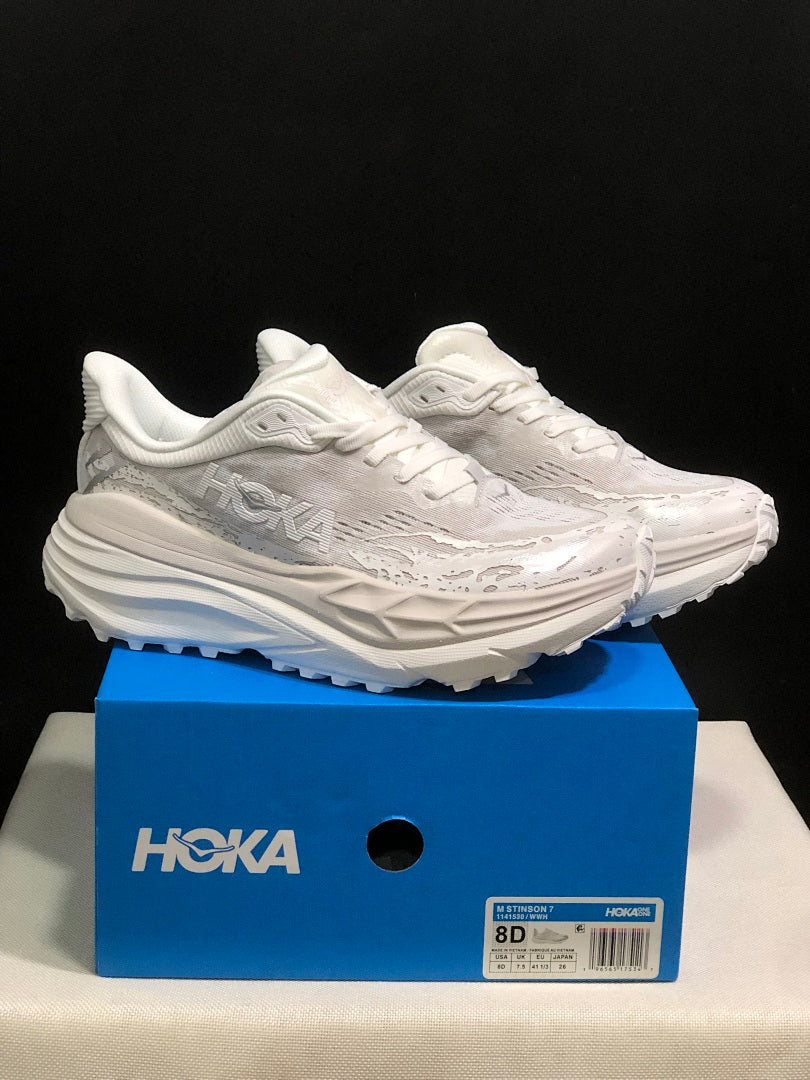 HOKA Stinson 7 Sneakers in White and Gray - product image from the listing.