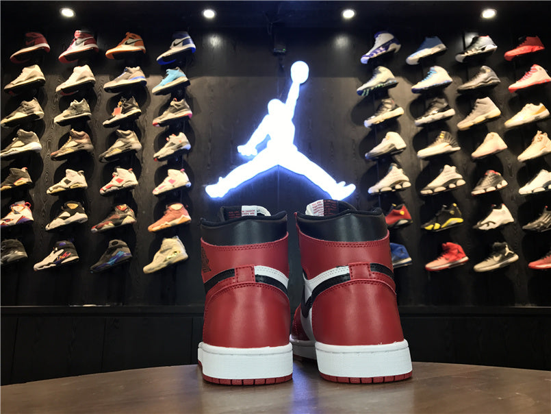 Air Jordan 1 High OG Sneakers in Black, Red and White - product image from the listing.
