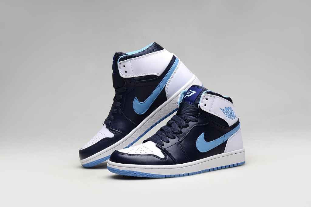 Blue and White Jordan 1 High Paul Edition Navy Sneakers - product image from the listing.