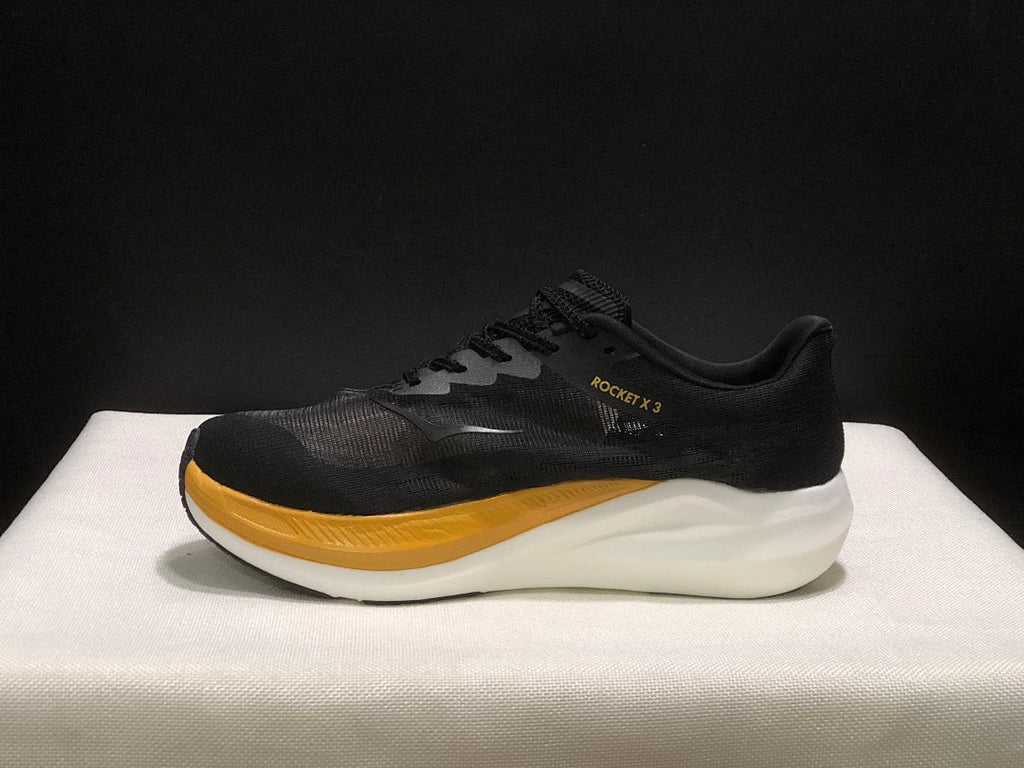 Black and Gold HOKA Rocket X 3 Running Shoes - product image from the listing.