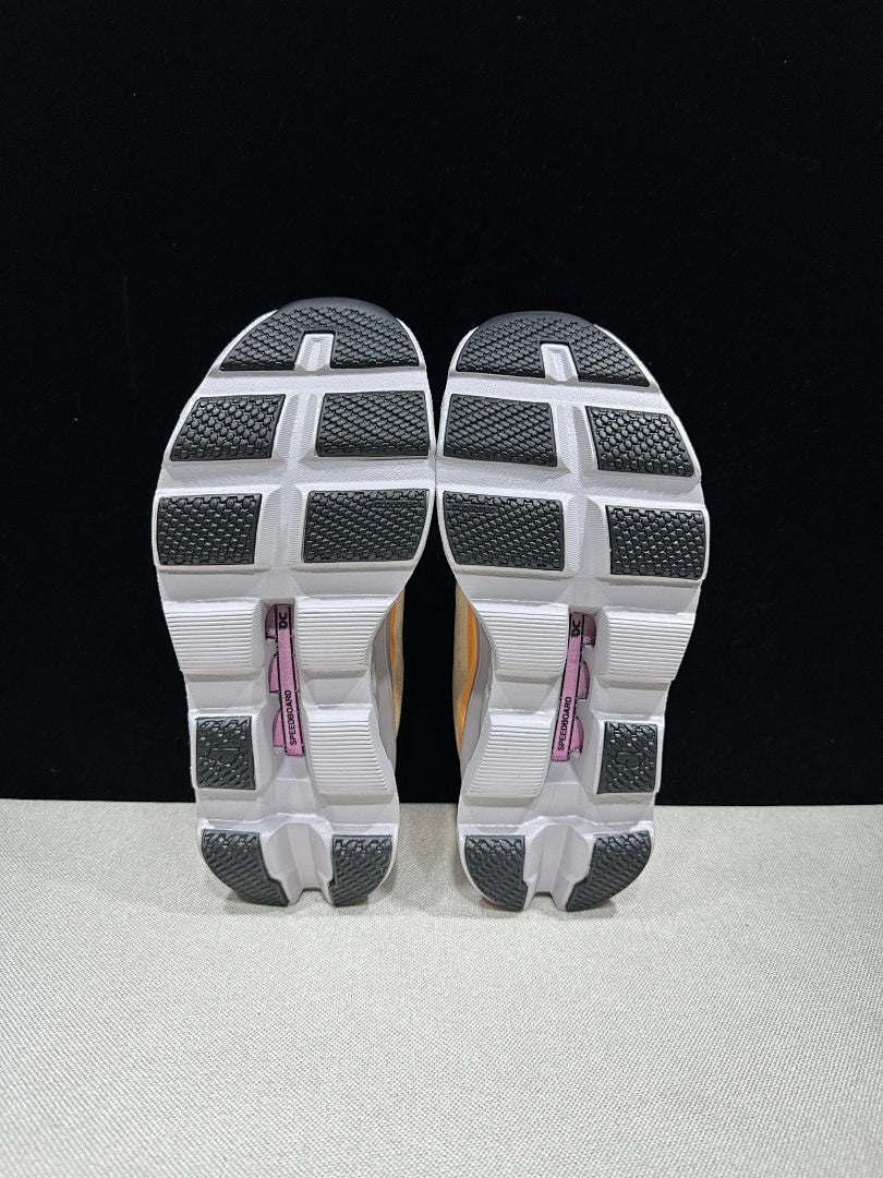 On Cloudmonster Running Shoes, in Pale Yellow and Orange - product image from the listing.