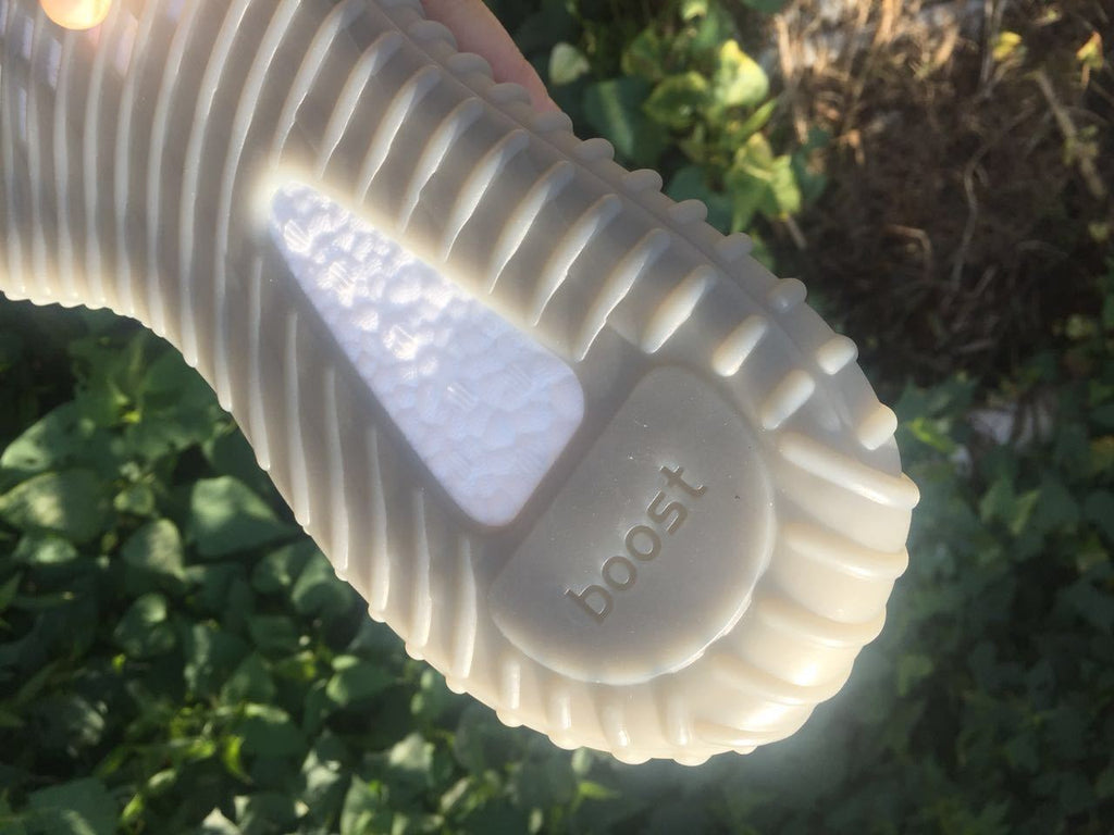 Yeezy 350 V2 Sneakers in Gray and Orange Knit - product image from the listing.
