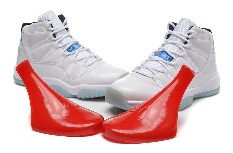 Air Jordan 11 Retro High-Top Sneakers in White and Blue - product image from the listing.