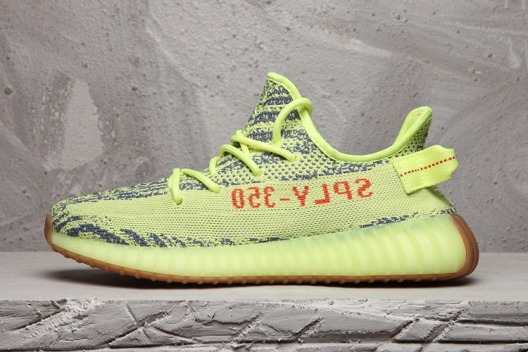 Lime Green and Brown Adidas Yeezy Boost 350 V2 Sneaker - product image from the listing.