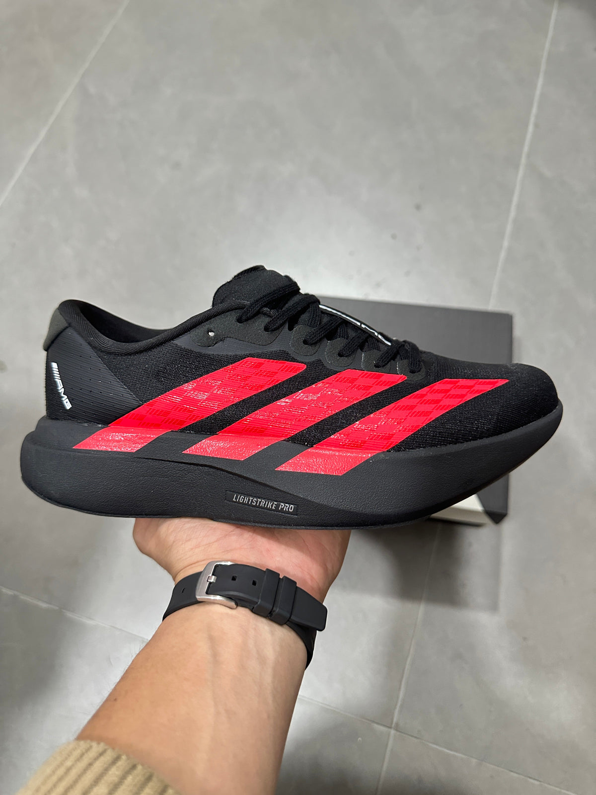 Adidas Lightstrike Pro AMG Running Shoes in Black and Red KH8832 - product image from the listing.