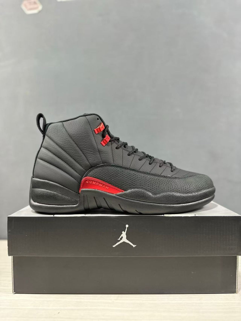Air Jordan 12 Retro Black Red CT8013-003 - product image from the listing.