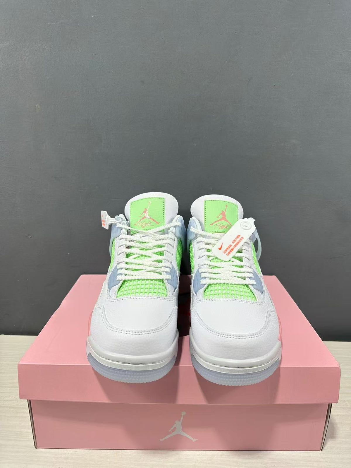 Air Jordan 4 Retro White Pink Green IB7068-100 - product image from the listing.