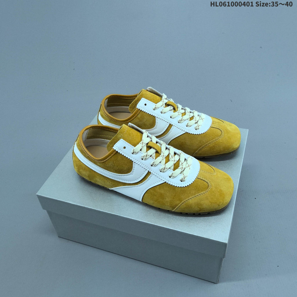 Women's GG Yellow and White Suede-Style Lace-Up Sneakers - product image from the listing.
