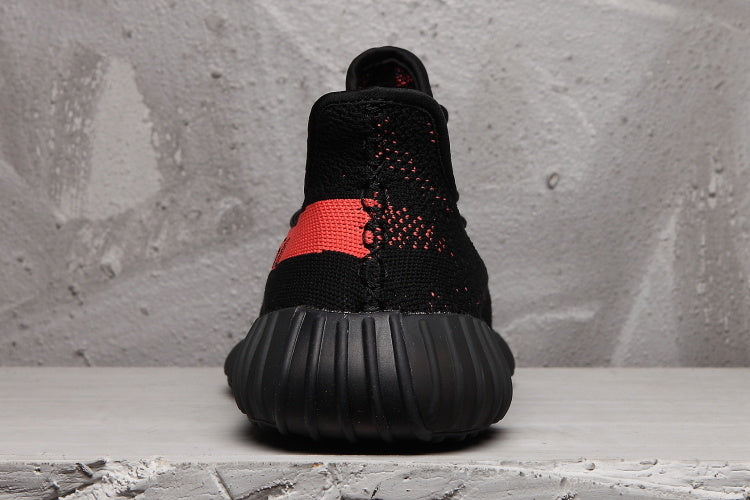 Yeezy 350 V2 Sneakers in Black and Red Knit - product image from the listing.