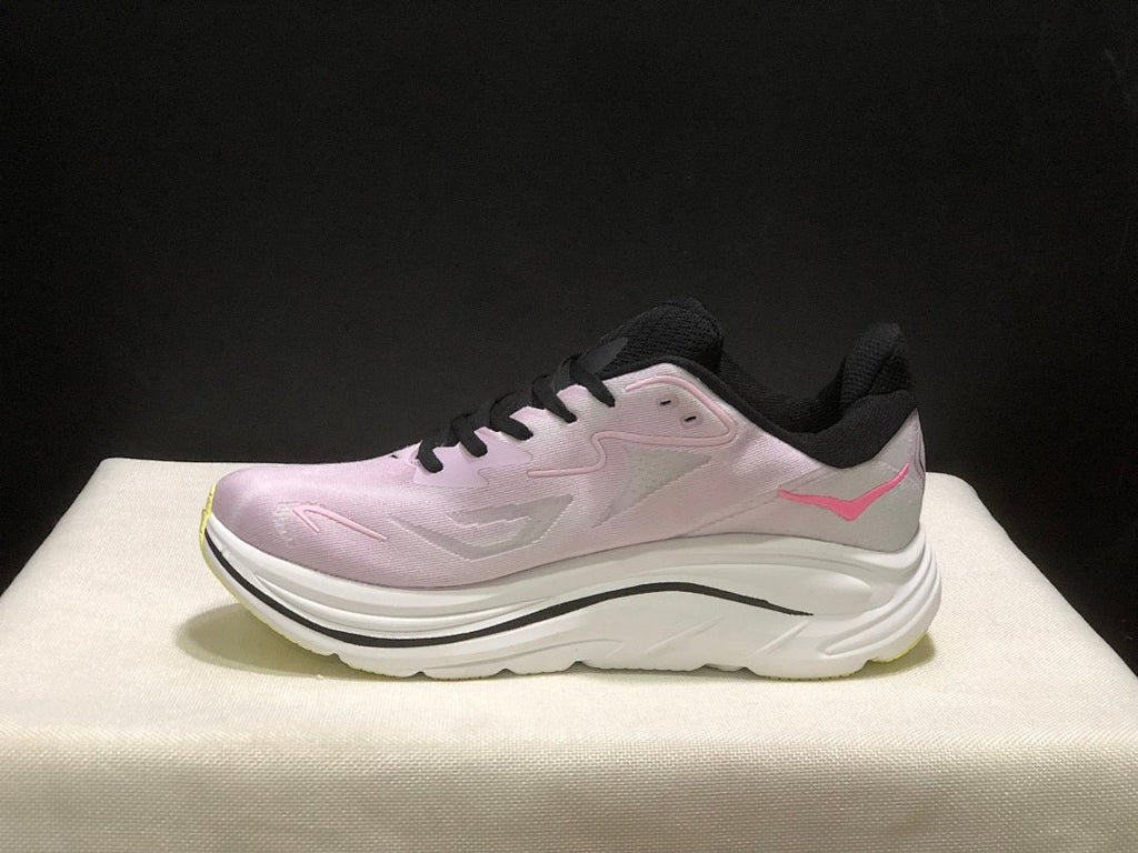 Pink and White HOKA Clifton 10 Running Shoes - product image from the listing.