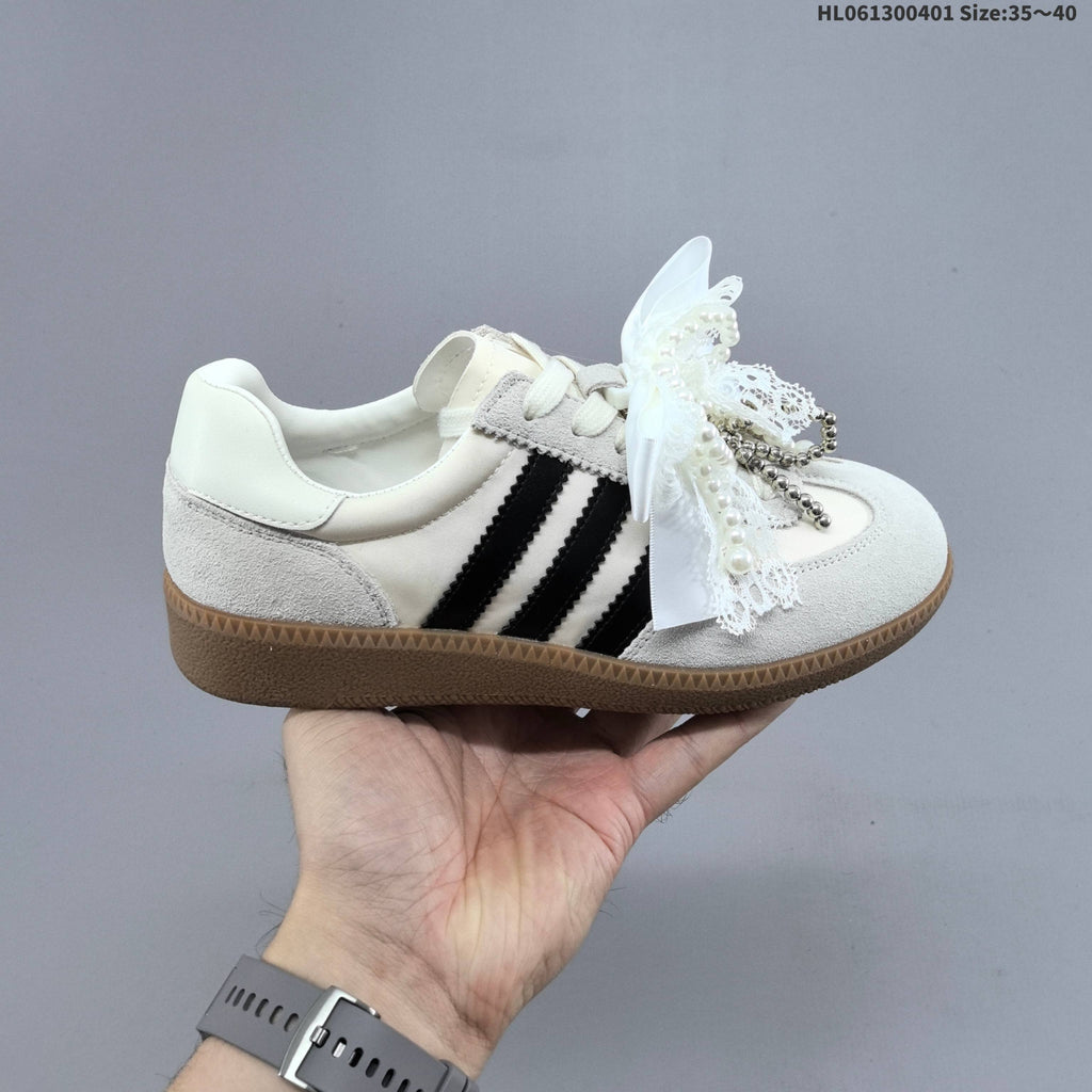 Ribbon and Pearl Bow Low-Cut Sneakers - product image from the listing.