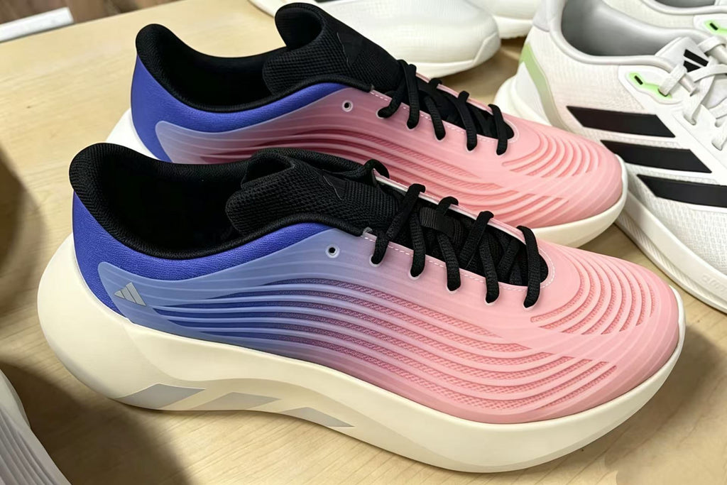 Pink and Blue Sneakers for Running with Black Laces - product image from the listing.