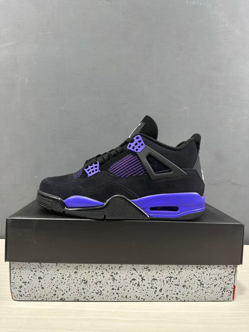 Air Jordan 4 Retro Black Blue Sneakers CT8527-018 - product image from the listing.