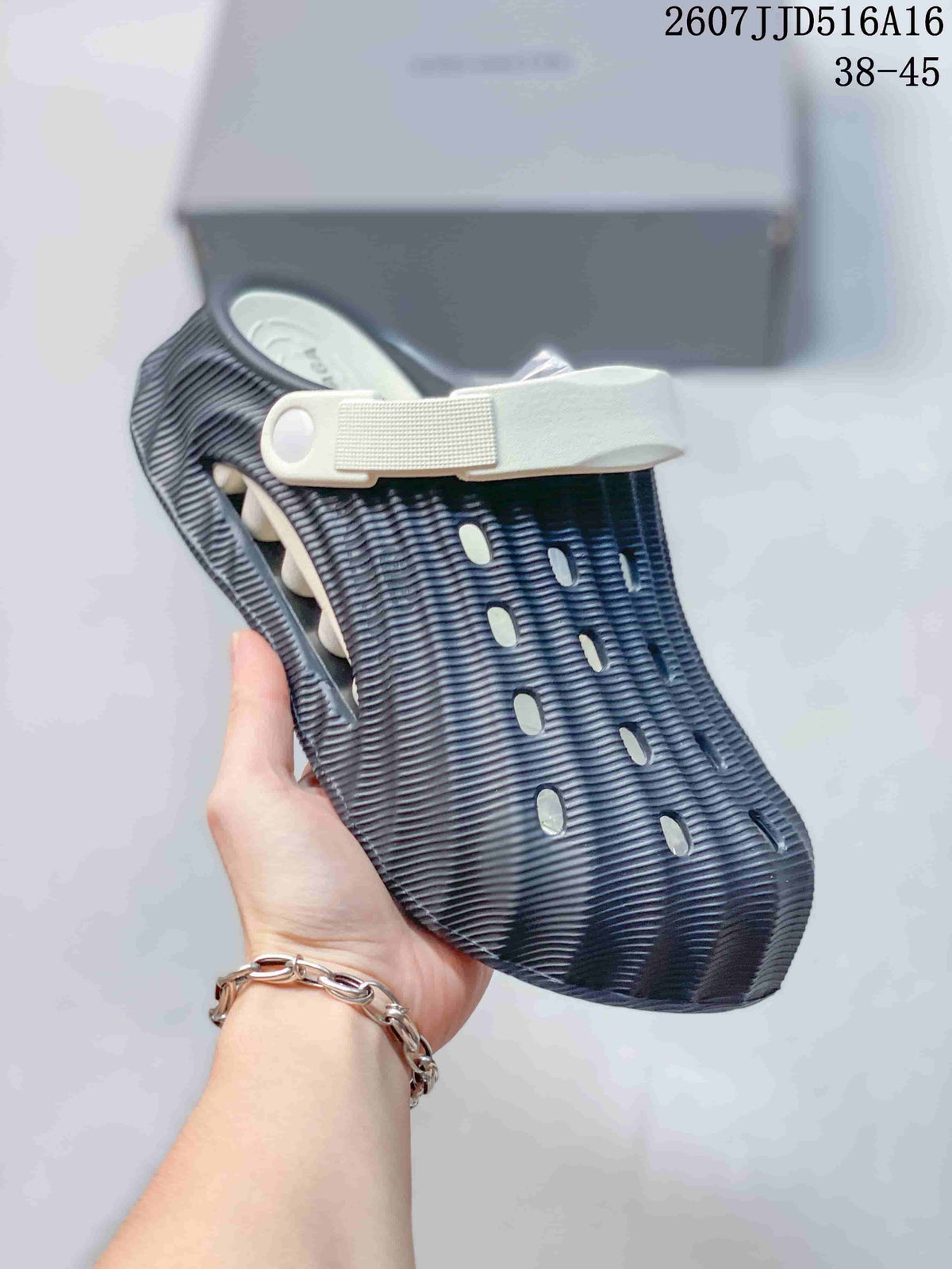 Balenciaga Logo Clogs in White and Navy 2607JJD516A16 - product image from the listing.
