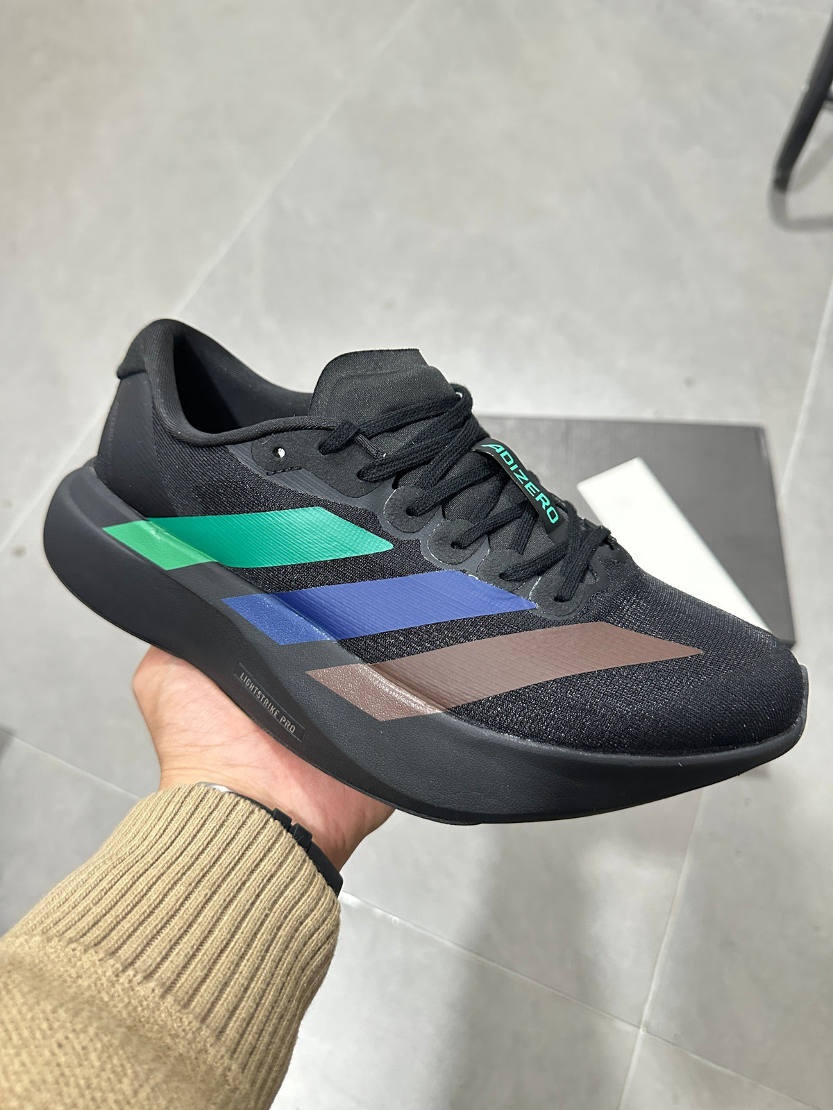adidas Lightstrike Pro Running Shoes in Black Multicolor - product image from the listing.