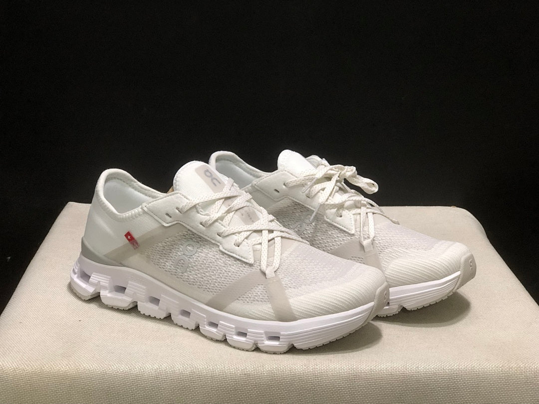 On Cloud X 4 AD Sneakers in White - product image from the listing.