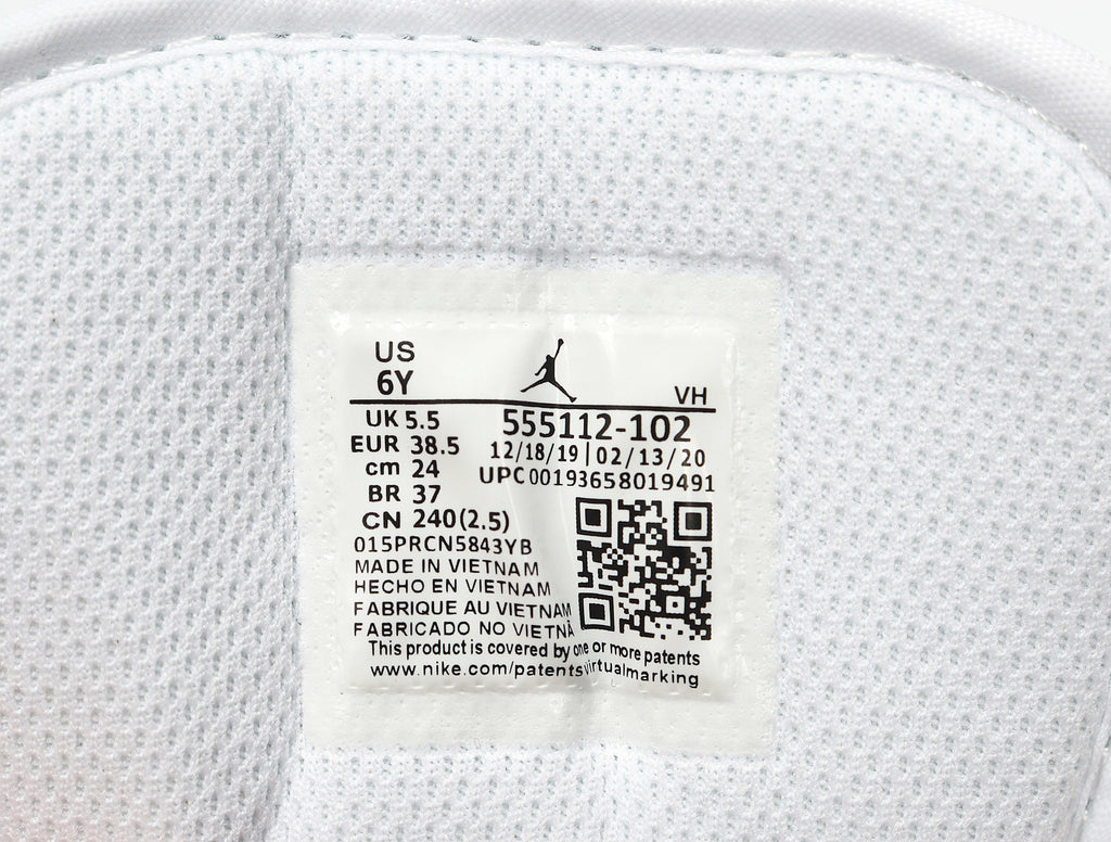 Jordan 1 Mid Sneakers in White Pink Turquoise 555112-102 - product image from the listing.