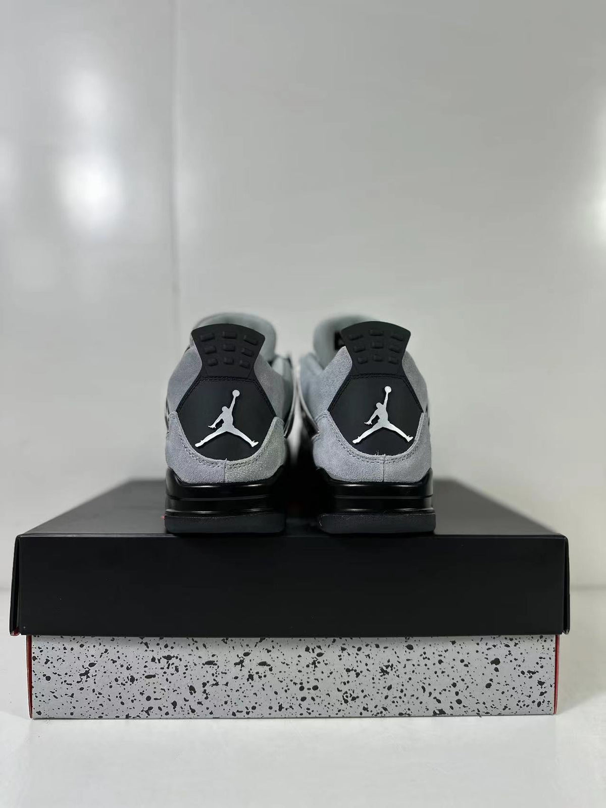 Air Jordan 4 Retro Gray Black Sneakers AQ9129-005 - product image from the listing.
