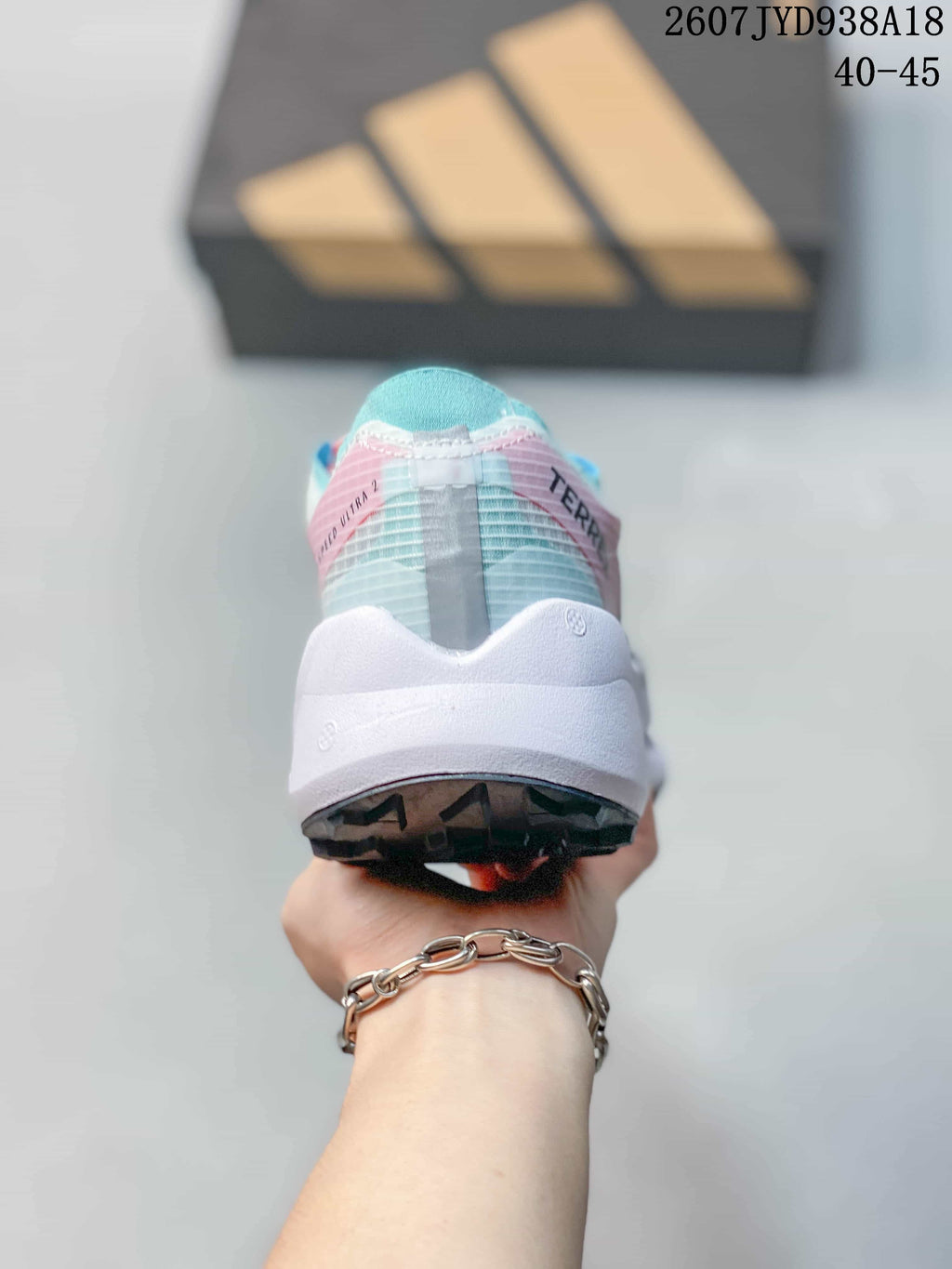 Adidas Adizero Evo SL 2 Running Shoes in White Pink Blue - product image from the listing.