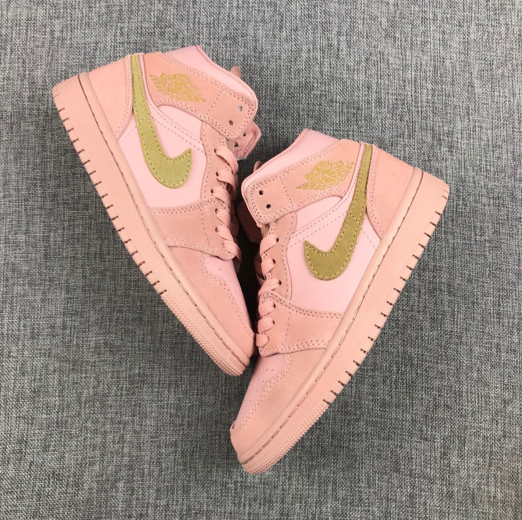 Jordan 1 Mid SE Sneakers in Pink 852542-600 - product image from the listing.