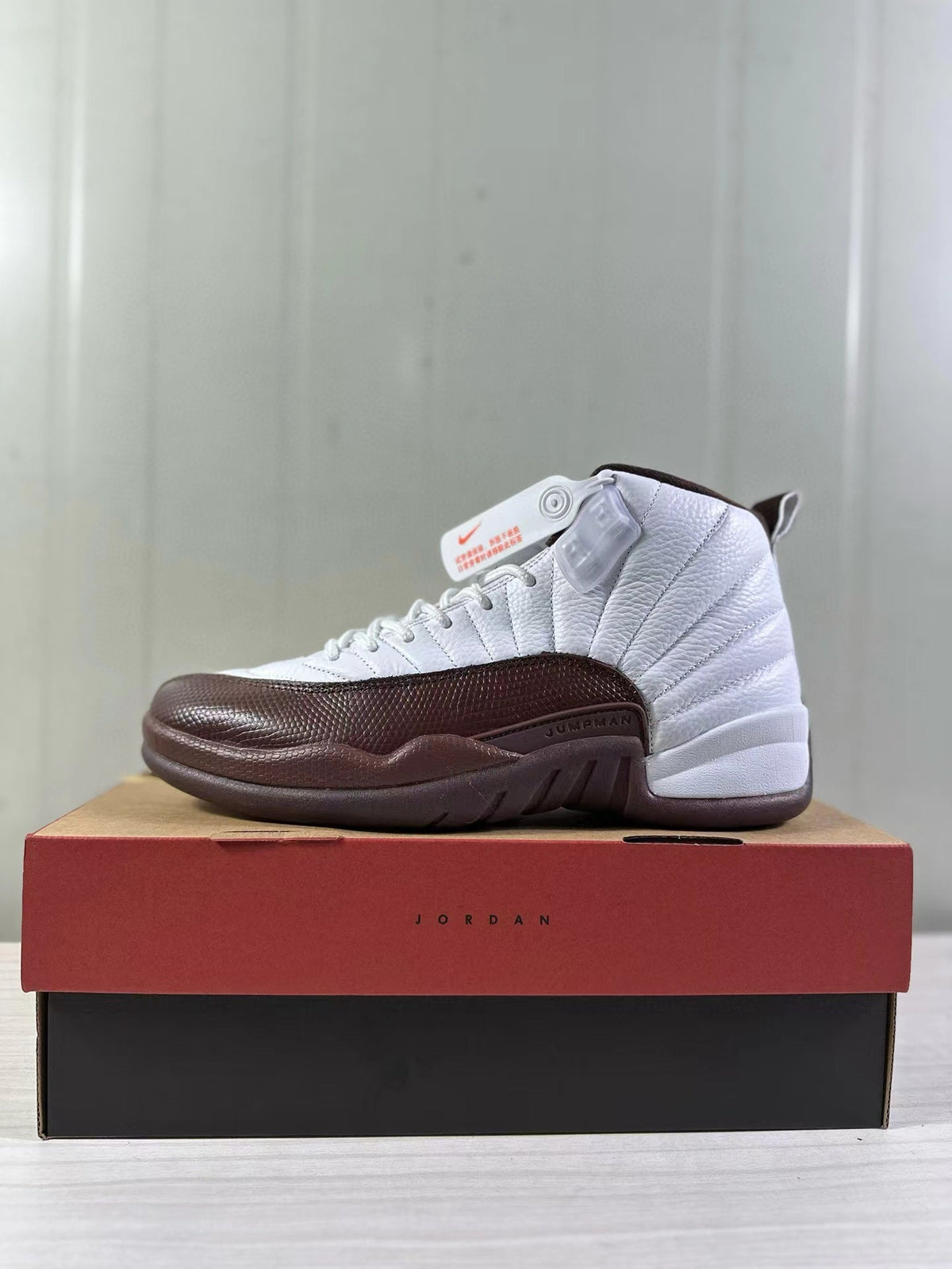Air Jordan 12 Retro White Brown FZ5026-100 Sneakers - product image from the listing.