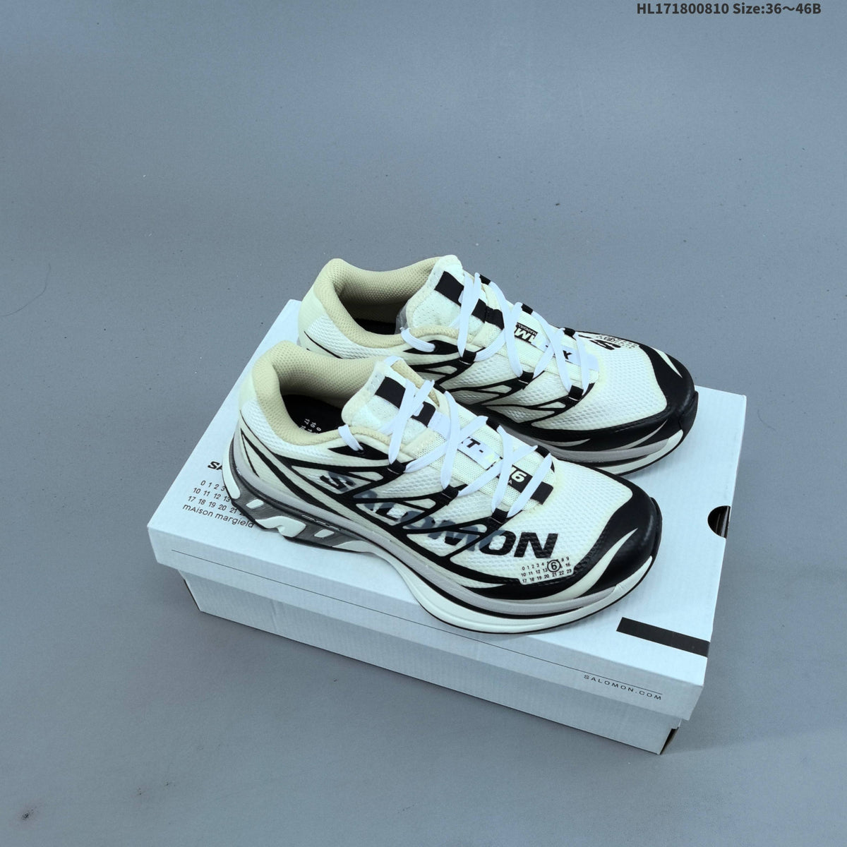 MM6 Maison Margiela x Salomon XT-4 Sneakers, in White and Black - product image from the listing.