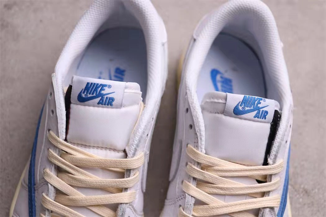 Jordan Travis Scott Air Jordan 1 Low in White Blue DM3277-100 - product image from the listing.
