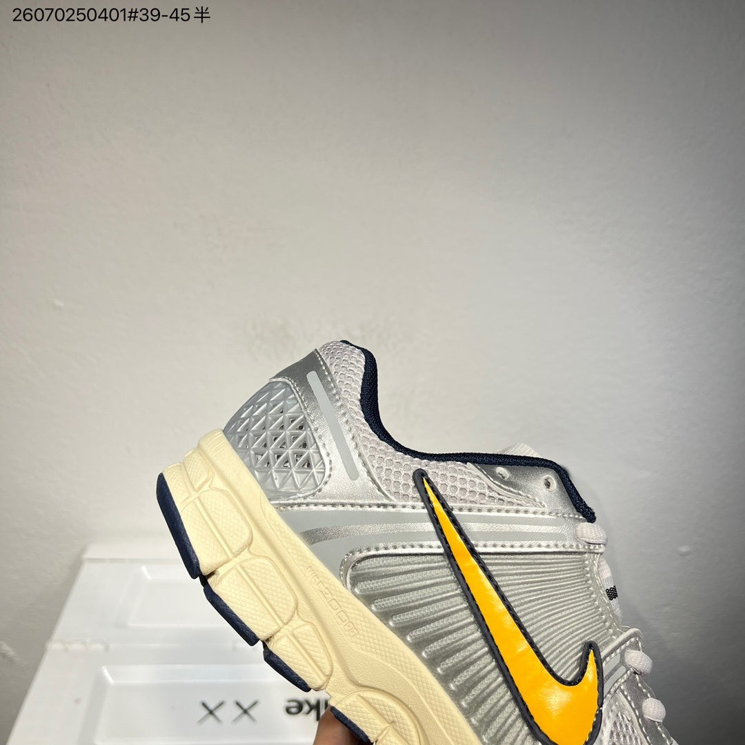 Nike Air Zoom Vomero 5 Running Shoes in White Grey Yellow - product image from the listing.