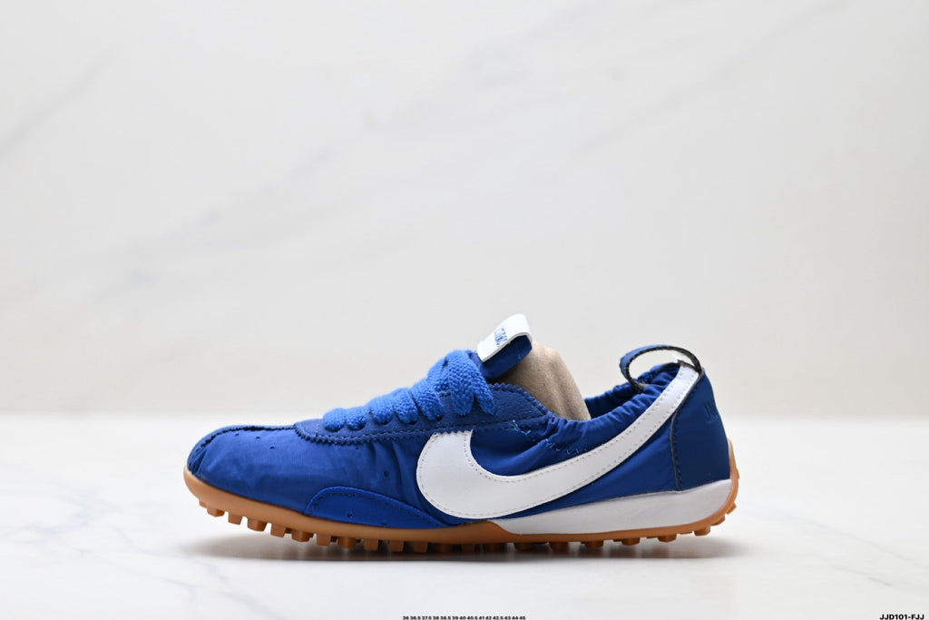 Jacquemus x Nike Jacumoon Low-Top Sneakers, in Blue and White - product image from the listing.