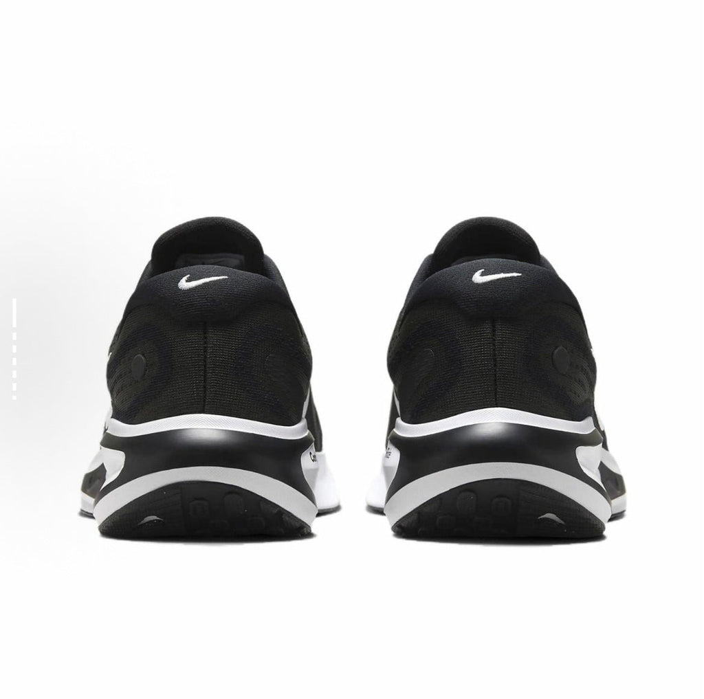Nike Journey Run Road Running Shoes in Black White FN0228-001 - product image from the listing.
