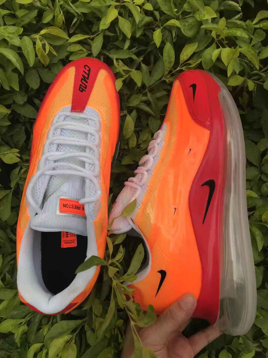 Orange and Red Nike Air Max 720 Sneakers - product image from the listing.