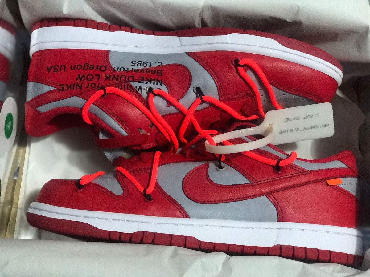 Nike Dunk Low LTHR / OW Sneakers in Red Gray CT0856-600 - product image from the listing.